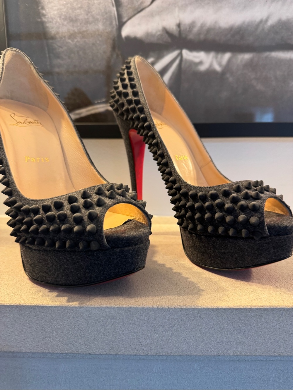 Christian Louboutin Black Spiked Peep-Toe Platform Pumps with Red Sole